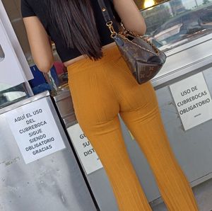 Perfect body pettite in tight orange leggings (OC).