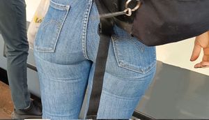 Hot booty in tight bue jeans closeups