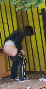 Girl taking a leak outdoors