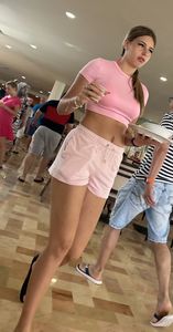 Hot teen chick wearing a pink top and shortrs creepshots, amazing long legs