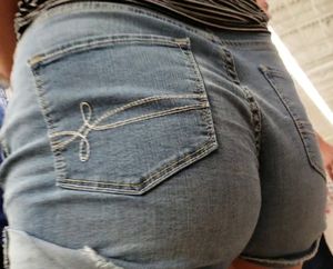 Brunette in jean shorts shopping @ walmart with friends