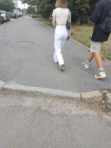 Sexy GF in tight white pants with a very hot ass walking down the street creepshot