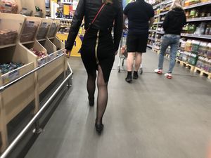 Nice legs in black pantyhose and hot ass in zipper skirt, hot chick on high heels at the supermarket creepshots