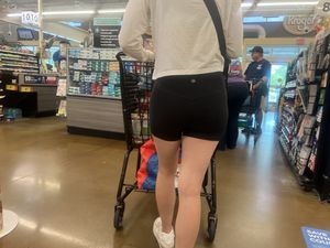 Hand print on tight ass Brunette (Biker shorts)