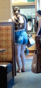 Busty and thick in short shorts