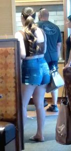 Busty and thick in short shorts