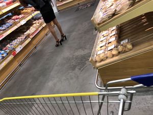 Nice legs in black pantyhose and hot ass in zipper skirt, hot chick on high heels at the supermarket creepshots