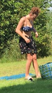 Sexy teen on the beach changing