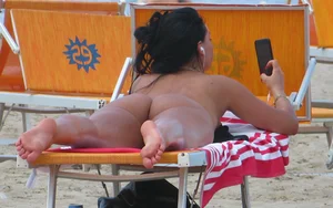 Nudist Girl at the Beach Candid Photo