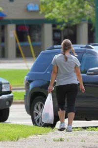 Thick girl out walking in black leggings
