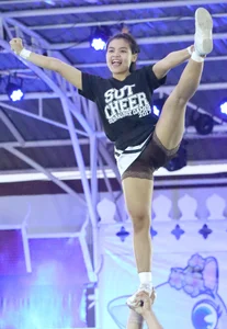 Bunch of athletic Thai cheerleaders at a competition