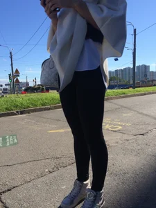 Blonde Girl With Fit Muscular Legs in Tight Black Jeans and Sneakers on a Crosswalk  - Street Creepshots Collection