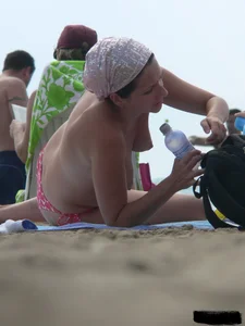 Sexy candid topless and nude beach girls