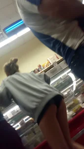 Supermarket Creepshot of Sexy Teen With Skinny Legs Shot from Below