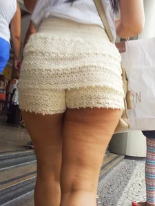 Big ass in shorts and ebony friend in leggings