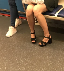 Hot Legs in High-Heeled Sandals in a Subway Train