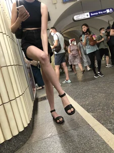 Amazing Hot Skinny Candid Girl in Shorts And Sandals Touching Her Leg on a Subway Station Creepshots Gallery