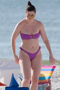 Pale chick in tiny purple thong