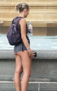 Candid Girl in Mini Shorts With a Perfect Fit Ass And Legs Standing By the Fountain Street Creepshot