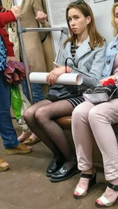Cute Girl with Skinny Legs in Pantyhose Busted the Candid Photographer in the Subway Train