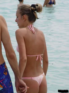 Beach voyeur girls in bikinis, thongs and topless