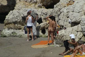 Girls on a nude beach in Sitges, Spain