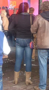 Girl in boots and tight jeans street creepshot