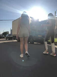 Girl With Nice Ass in Shorts and Legs Passing By on a Street Candid Photos