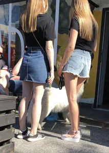 Girl in Denim Shorts with Amazing Hot Legs Fixing Her Sandals Street Candid Photo Gallery
