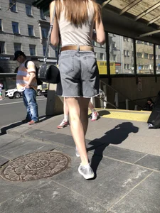 Hot skinny chick in shorts, very thin legs