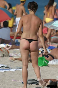 Beach voyeur girls in bikinis, thongs and topless