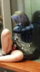 Teen in Mini-Shorts Sitting With Spread Legs