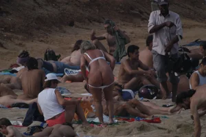 Topless girls on a beach in Barcelona