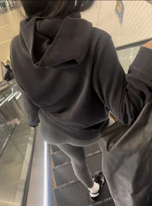 Tight curvy latina at airport pulls up pants