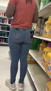 Hot warehouse girls in tight blue jeans with stuff in their back pockets