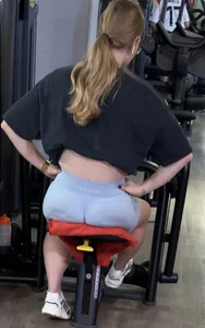 Hot blonde in gym just to show off her tight ass in blue shorts