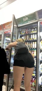 Blonde In Shorts Bending Over