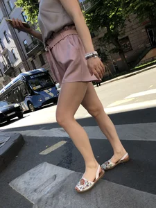 Cute candid girl in pink shorts street photos