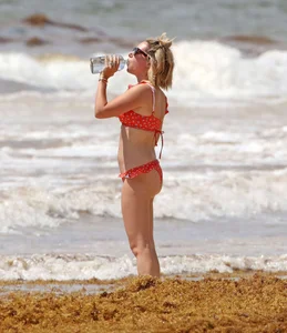 Ashley Tisdale in red bikini at a beach in Mexico