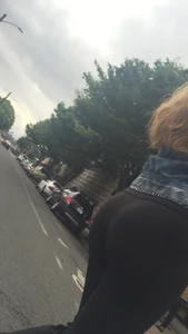 Girl with a nice ass in leggings walking down the street