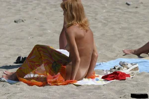 Beach voyeur girls in bikinis, thongs and topless