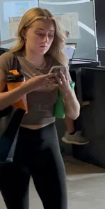 Blonde College Girl In Leggings Girl Keeps Touching Her Booty