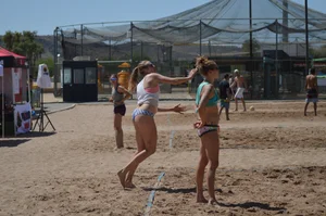 Beach volleyball blonde looking sexy and showing her body off