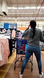 Latina with a bubble butt in tight jeans….
