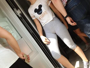 Skinny candid teen in short grey tights