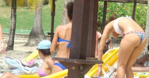 Amazing ebony ass in blue bikini with other sexy friends in bikinis