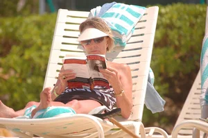 Bunch of sexy girls and milfs in bikinis at the beach