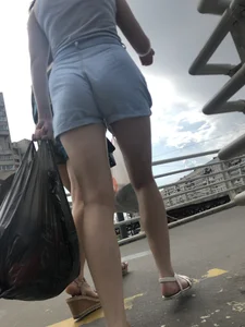 Sexy Butt And Legs in Denim Shorts - Candid Girl in Sandals Walking Up the Stairs Creepshots Gallery