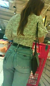 Sexy girl grocery shopping in jean with a nice ass
