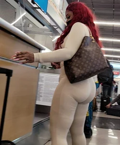 White body suit , booty jus hangin